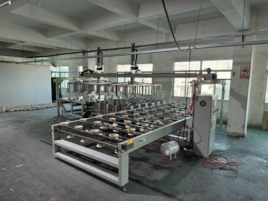 लंबे जीवनकाल उच्च गति रोबोटिक असेंबली पल्प मोल्डिंग कोटिंग मशीन 24 स्टेशन पल्प मोल्ड उत्पाद के लिए